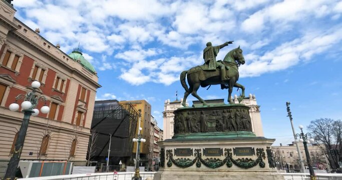 Monument of Prince Mihailo, located in the main Republic Square in Belgrade, Serbia.Beautiful blue sky with puffy clouds in background.	