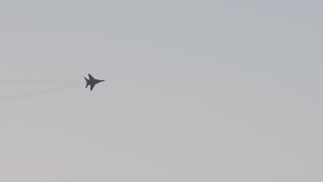 Ukrainian military fighter flies in the sky. Ukraine.