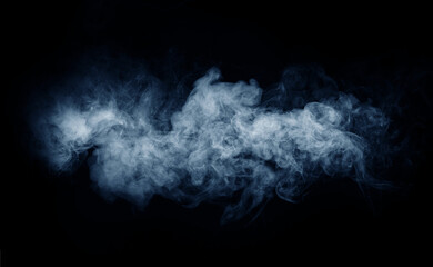 Abstract smoke texture over black. Fog in the darkness.