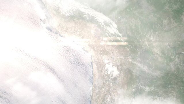Earth zoom in from outer space to city. Zooming on Tacna, Peru. The animation continues by zoom out through clouds and atmosphere into space. Images from NASA