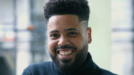 A young Brazilian hispanic latin man portrait smiling at camera