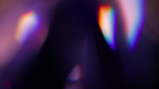 Multicolored light leaks 4k footage on black background. Lens studio flare leak burst overlays. Natural lighting lamp rays bokeh effect. For compositing over your footage, stylizing video, transitions