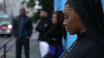 Thoughtful black girl outside in street