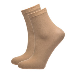 A pair of fabric socks stands on a white isolated background. Volumetric socks on a transparent mannequin. Brown socks.