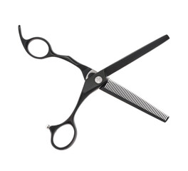 Scissors for cutting people and pets. Grooming scissors. Opened scissors on a white isolated background. Side view.