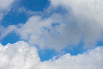 White Clouds In The Blue Sky. Sunny Day.