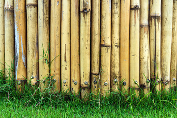 Old brown tone bamboo simple wall or Bamboo fence texture background for exterior design vintage...