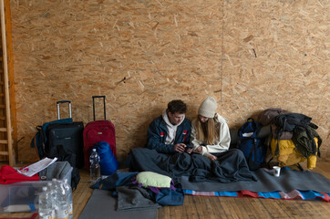 Ukrainian war refugees in temporary shelter and help center.