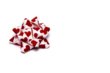 Closeup stitch gift ribbon hearts white background