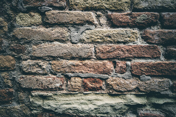 Old brick wall, grunge background. Copy space. Toned