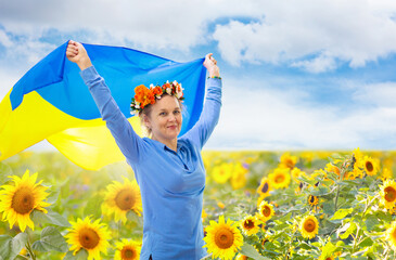 Pray for Ukraine. Woman with Ukrainian flag.