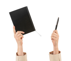 Businesswoman with notebook and pen on white background