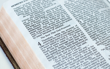 Sabbath seventh-day rest (fourth commandment) verses in an open Holy Bible Book. God Jesus Christ's...