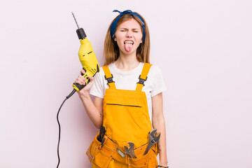 pretty woman with a drill handyman concept