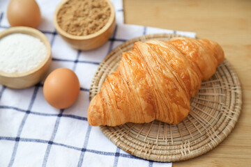 fresh baking almond croissant from homemade bakery cooking. fresh baked for good health care eating lifestyle.