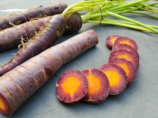 Cosmic Purple Carrots with orange insides 