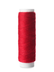 Red sewing thread spool on white background