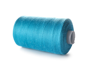 Blue sewing thread spool on white background