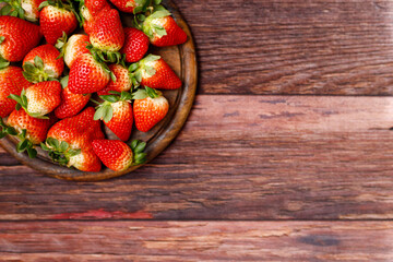 Fresh juicy strawberries with leaves. Strawberry..