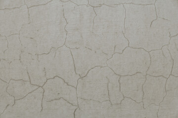 Abstract background, old cement wall. A concrete wall texture with cracks and scratches.