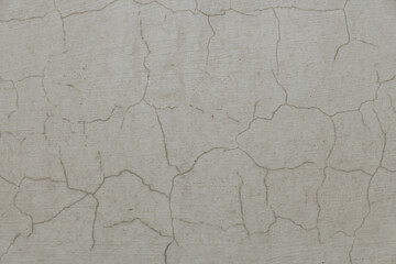 Abstract background, old cement wall. A concrete wall texture with cracks and scratches.