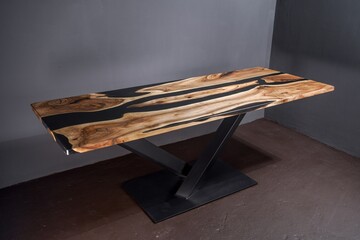 Modern wooden table made of epoxy