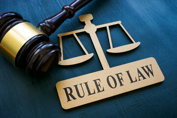 Plate in the form of scales and an inscription Rule of law.