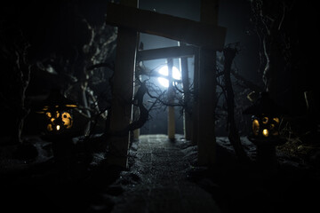Fototapeta na wymiar Creative artwork decoration. Abstract Japanese style wooden tunnel at night. Selective focus