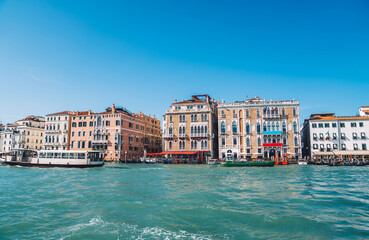 Landscape view on European cityscape of ancient district located at Grand Canal in Venice, architecture buildings during summer daytime - perfect place for honeymoon vacations on getaway trip