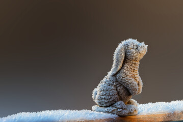 Easter bunny made of ceramic with hoarfrost