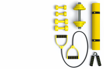 Top view of sport equipment like yoga mat, dumbbell and expander on white