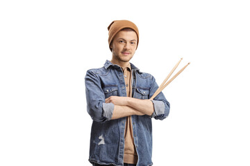 Guy musician holding drumsticks