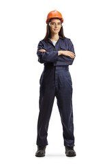Female worker in a uniform with a helmet and goggles posing