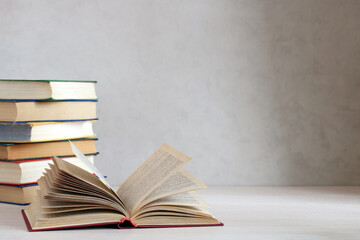 open book on a table on a light background.