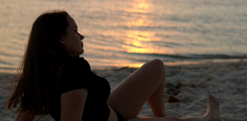 Relaxing at the beach of Miami after sunset