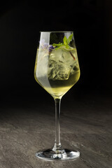 Mint alcoholic drink. Photo of drinks on a dark background