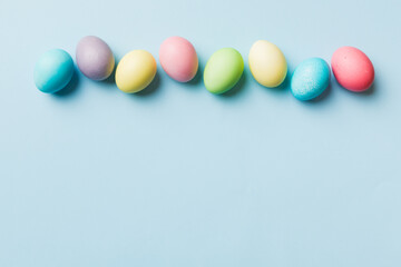 holiday preparation Multi colors Easter eggs on colored background . Pastel color Easter eggs. holiday concept with copy space