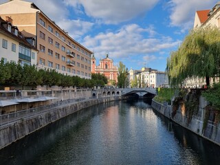 Fototapeta premium City center of Ljubljana with famous three bridges over Ljubljanica river - Tromostovje made from architect Plečnik 