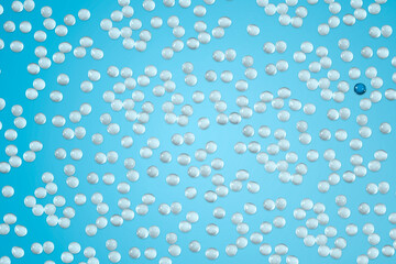 Medical pills and tablet. Macro top down view with background detail