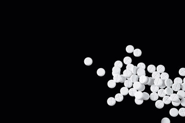 Medical pills and tablet. Macro top down view with background detail