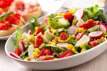 Summer Salad with Mixed Colorful Vegetables on a Plate