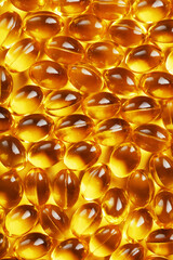 Golden capsules of Vitamin Omega 3 Fish Oil close-up