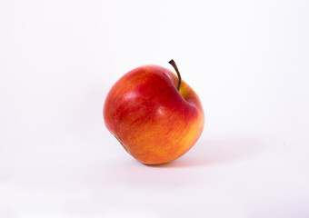 Apple on a white background with a shadow.
