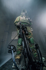 Fototapeta premium Fighter with a crossbow. Apocalypse