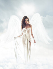 Your guardian angel. Portrait shot of a beautiful angel walking through the heavens.