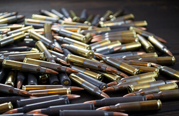 Fototapeta premium Golden pistol bullets