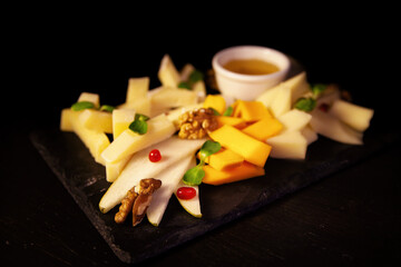 Assorted fruit on a black background
