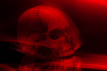 Skull in red on a black background