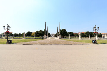 Large square Prato della Valle with obelisks and statues in Padua, Italy