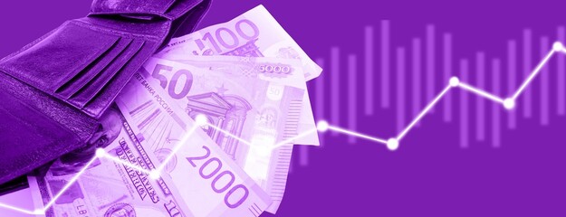 Top view of the multicurrency in a very pleasant tone. Euro, dollar, ruble banknotes highlighted on a white background.Cash. The concept of financial literacy and depositors. a stack of dollars